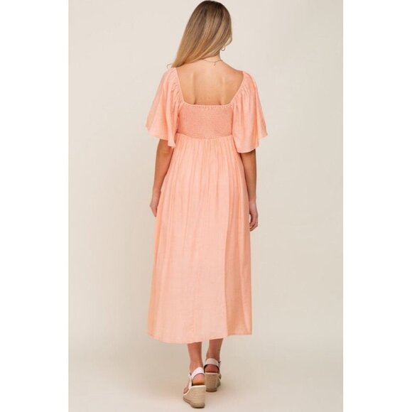 Chic Peach Midi Maternity Dress with Bow Detail - Pink Blush Maternity - Picture 3 of 12